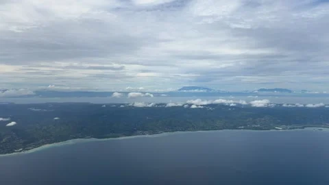Manila to Boracay flight plane window view POV Philippines Southeast Asia travel Stock Footage 340544256