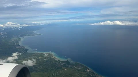 Manila to Boracay flight plane window view POV Philippines Southeast Asia travel Stock Footage 340544308