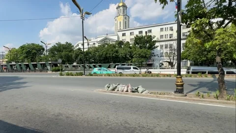 Manila City Hall clock tower and street traffic 4K 库存影片 337451087