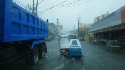 Manila city traffic during rain storm Stock Footage 255153953