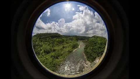Manila: Stream with Clouds and Trees during Day, Ultra Wide Stock Footage 70648861