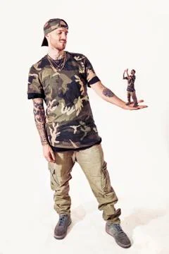 Manipulation of two rap singers posing in studio Stock Photos