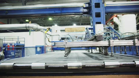 Manipulator with vacuum suction cups moves above conveyor Stock Footage 228780028