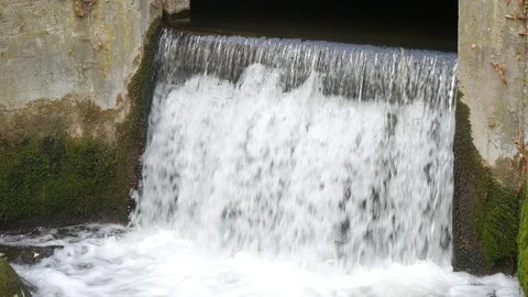 A manmade dam in a small river Stock Footage 100192615