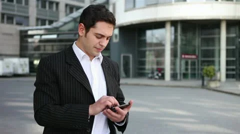 Mann with phone holding thumbs up Stock Footage 11196139