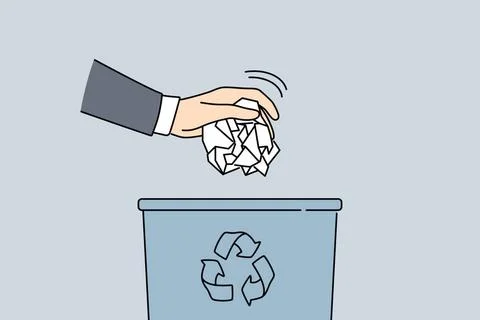 Mann wirft Papier in Mülleimer Man hand put paper in trash bin. Closeup of.. Stock Photos