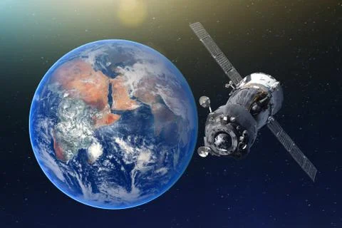 Manned spacecraft orbiting the earth. Elements of this image furnished by NAS Stock Photos