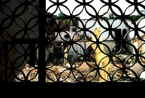 Mannequin in a broken down store front 写真素材