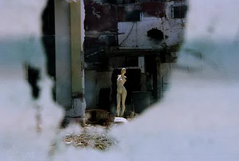 Mannequin in a broken down store front 2 写真素材