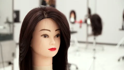 Mannequin head for practicing hairdressing Stock Footage 164059164