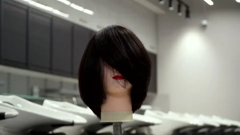 Mannequin head for practicing hairdressing Stock Footage 164060212