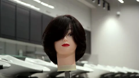 Mannequin head for practicing hairdressing Stock Footage 164060329