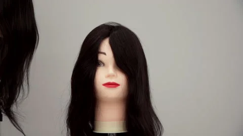 Mannequin head for practicing hairdressing 스톡 동영상 164106480