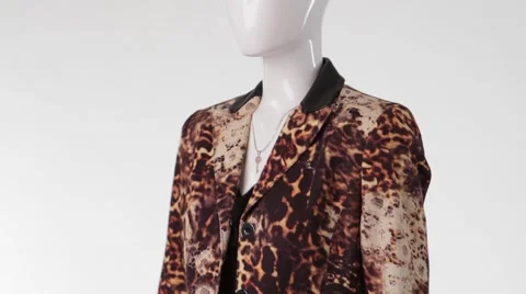 Mannequin in leopard blazer turning. Stock Footage 62052961