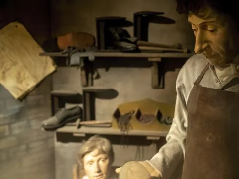 Mannequin model of a shoemaker at work Stock Illustration