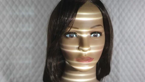 Mannequin with projected light on face. Beaming up. Space travel. Sci-fi. Stock Footage 186892008
