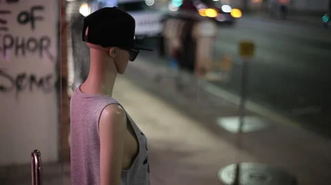 Mannequin on the sidewalk Stock Footage 46810414