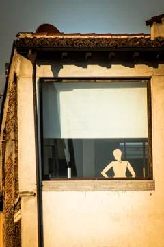 Mannequin at the window Stock Photos