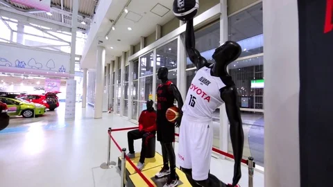 Mannequins of Toyota basketball team in Toyota Mega Web. Tokyo, Japan Stock Footage