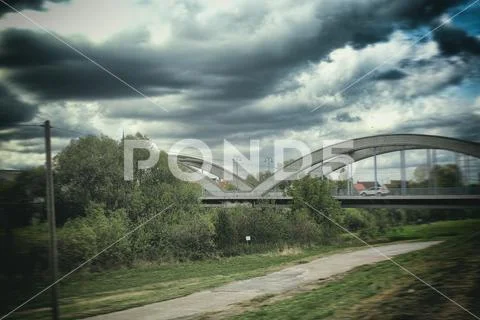 Mannheim Seckenheim bridge Neckar river nature cloud sky Stock Photos