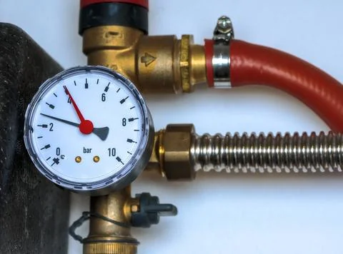 Manometer in the water solar heating system of a house Cloesup of a manome... Stock Photos
