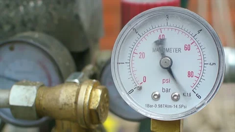 Manometer working on a compressor with jumping arrow close up Stock Footage 180602606