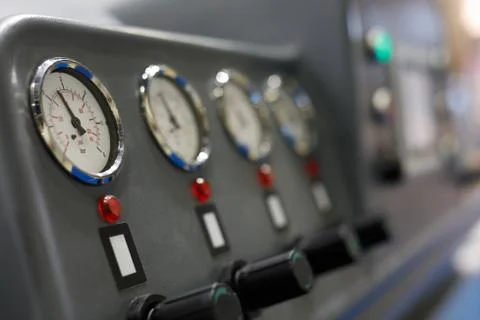 Manometers on a control panel Stock Photos