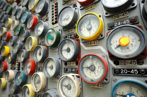 Manometers of the cooling system of reactor set on main control board Stock Photos