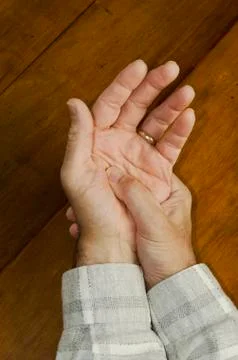 Man's arthritic hands Stock Photos