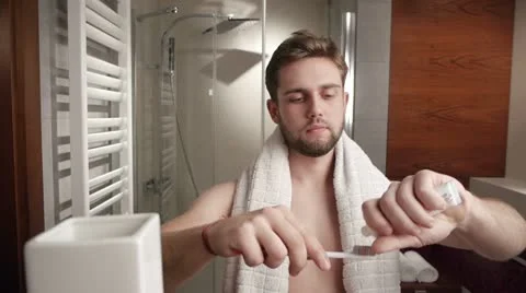 Man's bathroom routine Stock Footage 11845369
