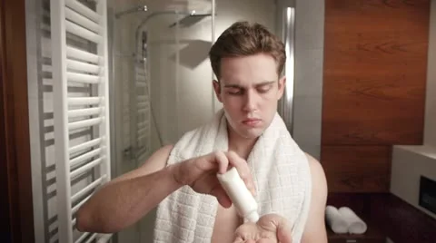 Man's bathroom routine Stock Footage 11849091