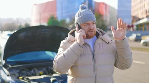 A Man's Desperate Call for Emergency Help with a Stock Footage 234137089