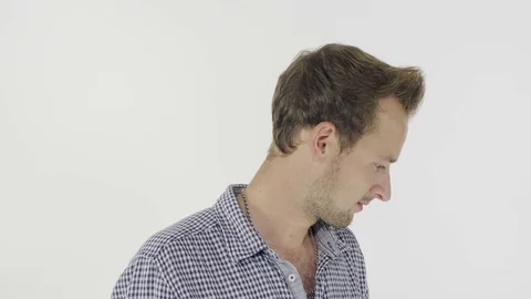 Man's emotion expression on a white background. 스톡 동영상 80318650