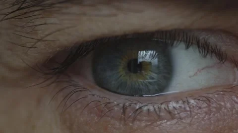 A man's eye with a beautiful blue iris in close-up. Healthy eyesight Stock Footage 285012503