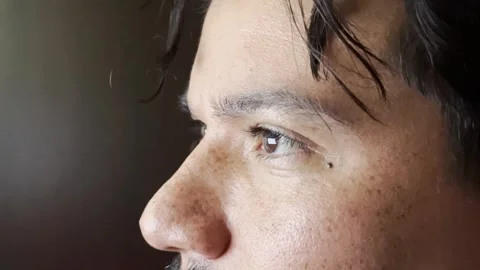 Man's eyes using a computer in close up Stock Footage 347792468