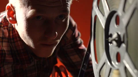 Man's face on a red background. Full HD Stock Footage 86069225