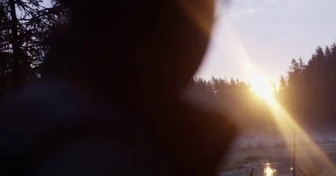 Man's face with sunbeams 動画素材 76233934