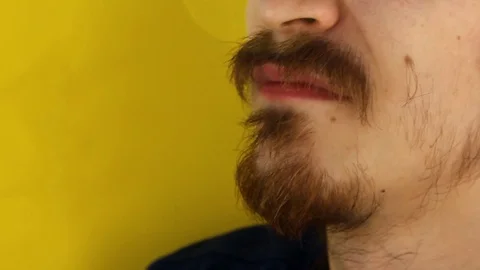 Man's face with thick white milk covering upper lip. June 1 World Milk Day. Stock Footage 130125916
