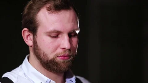Man's face while playing the piano Stock Footage 75628215
