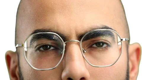 Man's face, on a white background, close-up Stock Photos