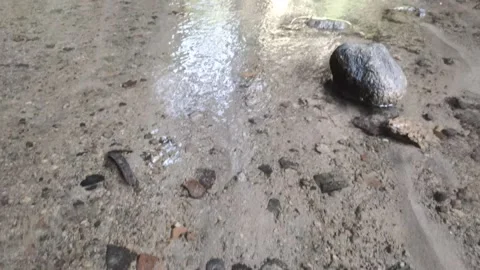 A Man's Feet in A River 動画素材 324350451