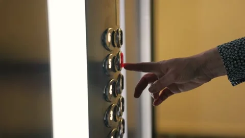 Man's female hand presses elevator button to move up.Movement to success, career Stock Footage 153926799