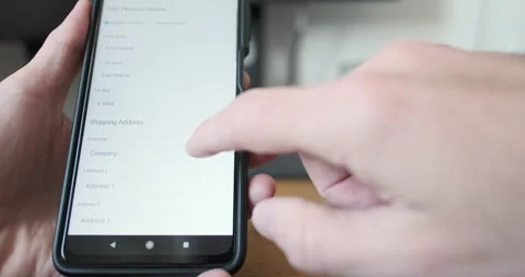 Man's finger presses checkout button on smartphone screen. Front view, close-up Stock Footage 255783343