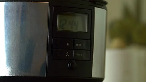 Man's Finger Pushing The "On" Button Of The Coffee Maker, Morning Ritual Stock Footage 85555801