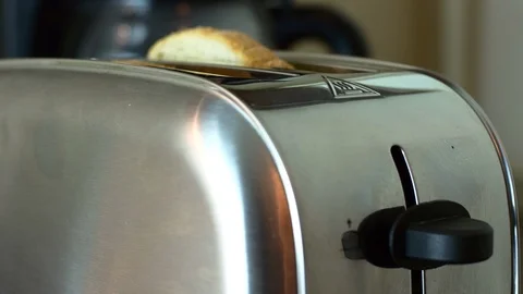 Man's Finger Pushing Down The Toaster Button, Breakfast, Detail Stock Footage 85556800