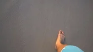 Mans Foot Walking On The Beach Stock Footage