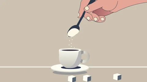 Man's hand adding sugar to a cup of coffee. The hand is holding a spoon wit.. Stock Footage 304775109