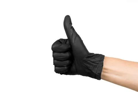 A man's hand in a black rubber glove shows a thumbs up isolated on a white ba Stock-Fotos