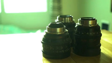 Man's hand cleaning camera lens 動画素材 83305237