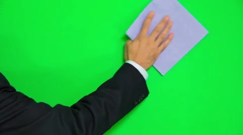 Man's Hand Cleaning Green Surface With Rag - Circular Motion Stock-Footage 56598940
